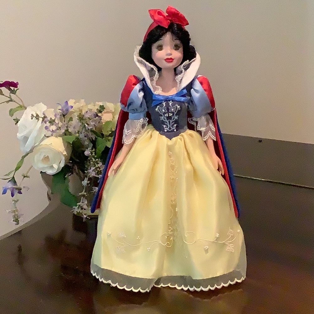 Snow white porcelain doll with stand